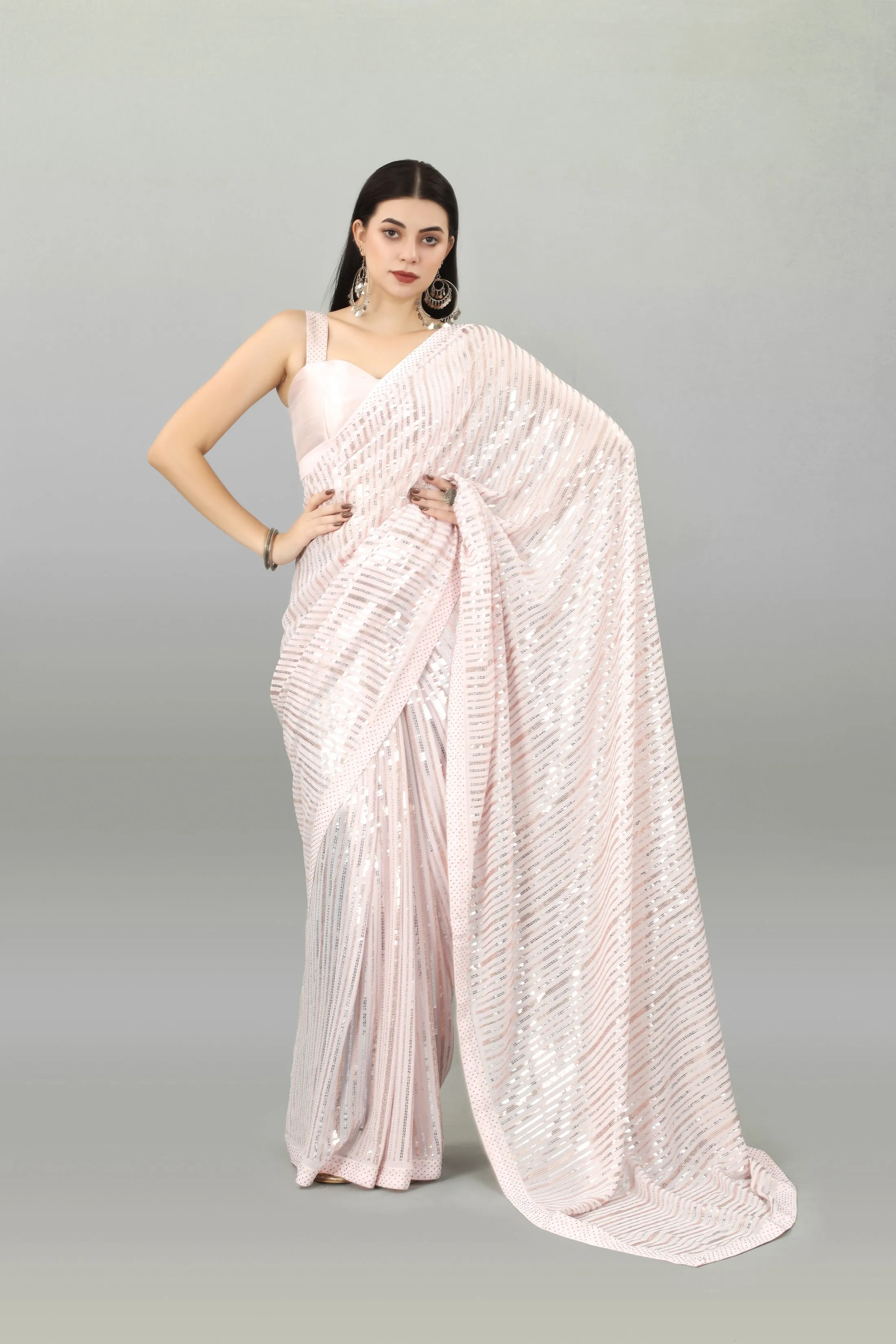 Women Party Wear Sequence Worked Light Peach Colour Heavy Georgette Saree Collection